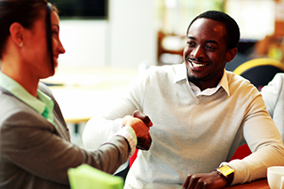 Portrait of a businesspeople handshaking